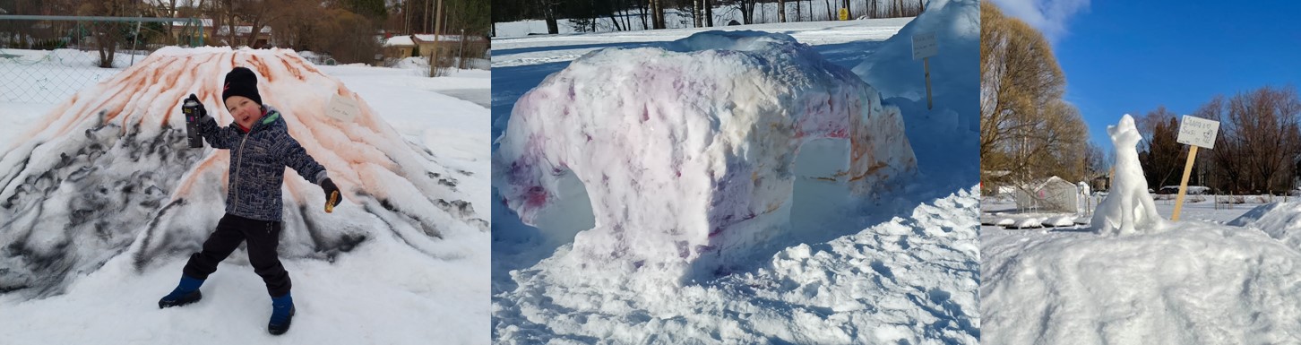 Kuvassa Lumen Lumo tapahtuman lumiveistoksia: lumilinna, tulivuori ja susi.